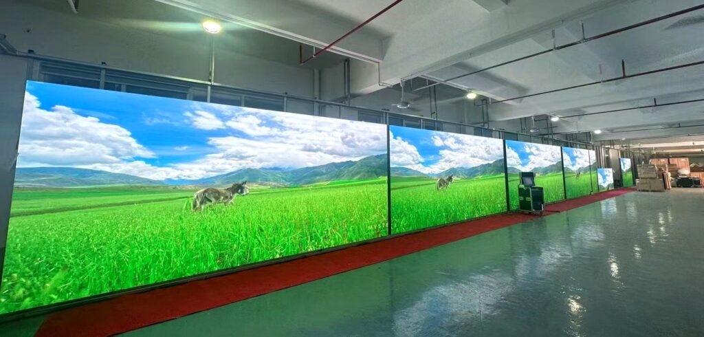 LED panel ageing test — full wall lit in the ageing hall